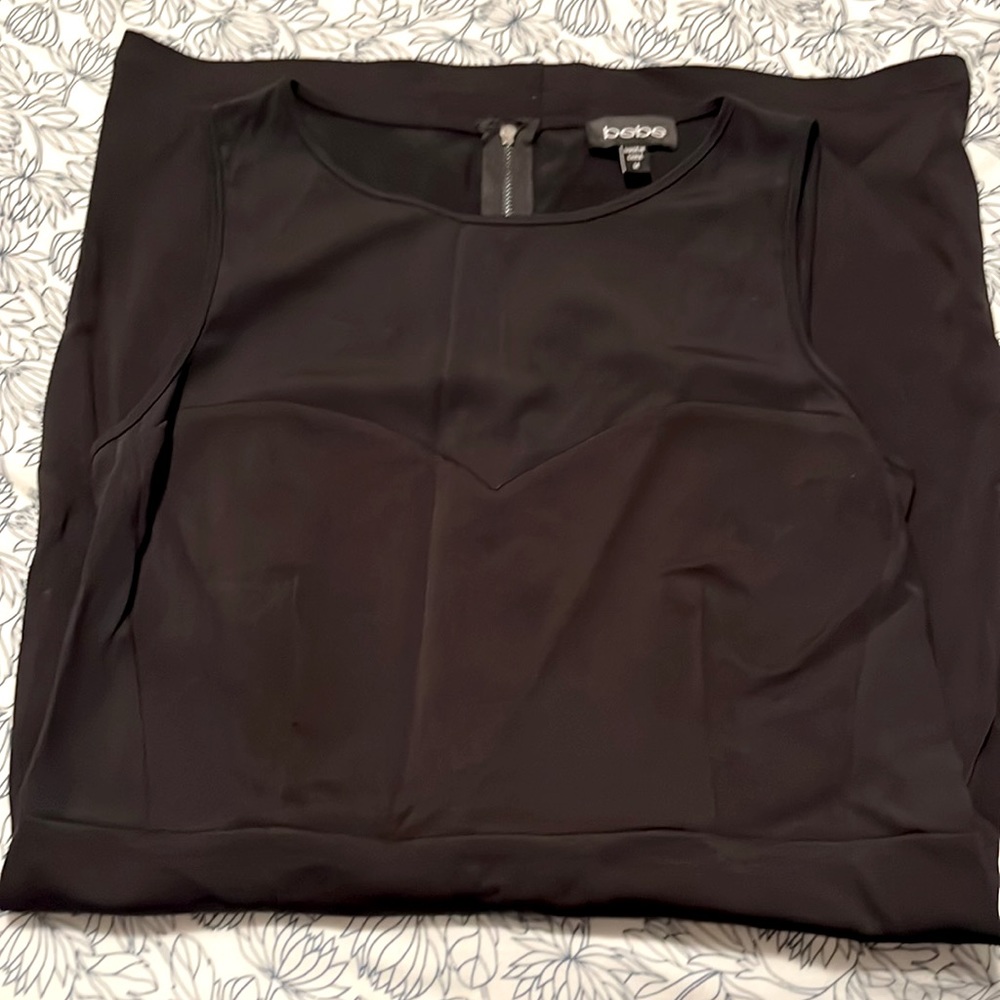 Bebe black cocktail dress with sweetheart neckline, see-thru material above